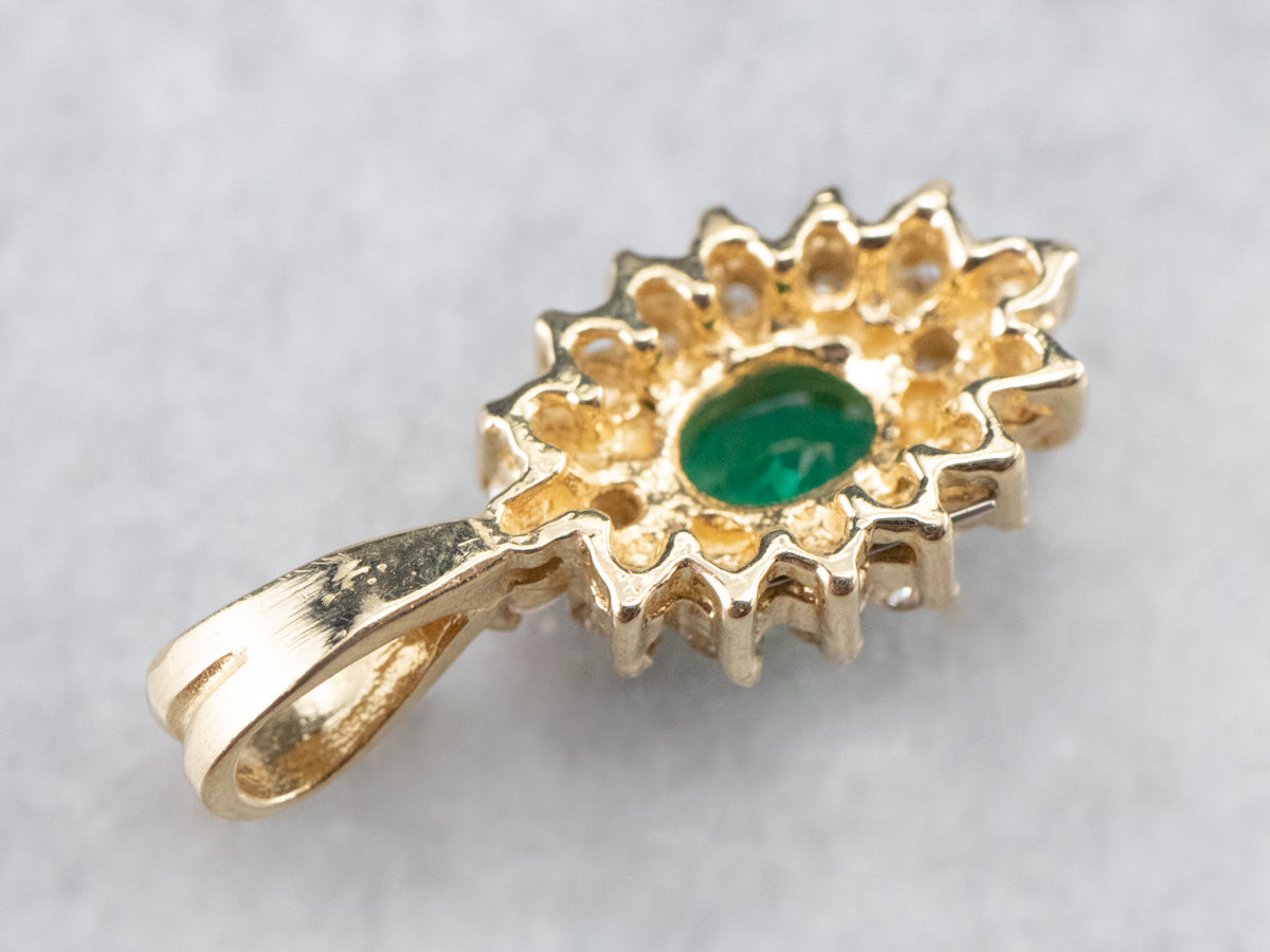 Gold Emerald and Diamond Halo Pendant