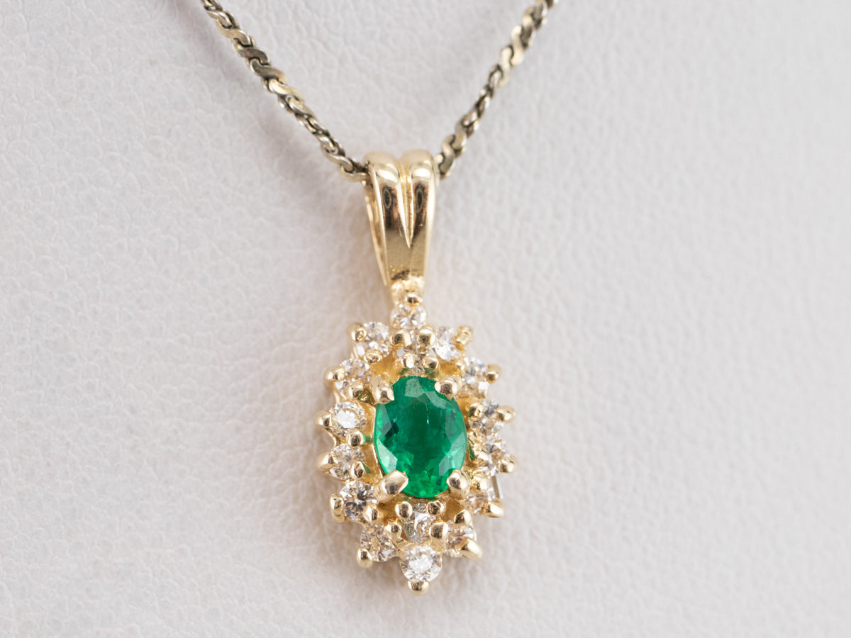Gold Emerald and Diamond Halo Pendant