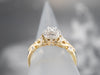 Scrolling Diamond Halo Engagement Ring