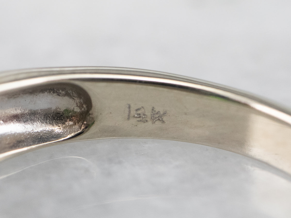 Anillo de granate tsavorita y diamantes