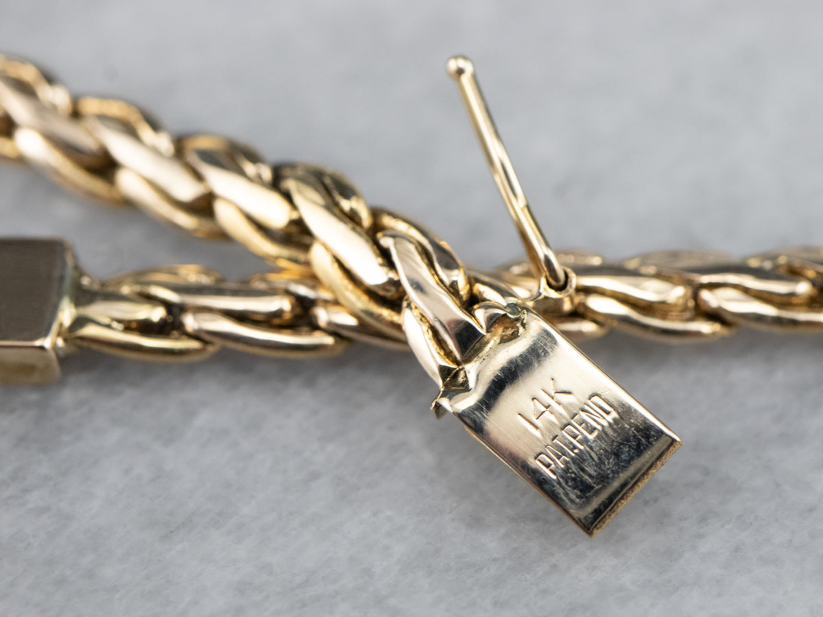 Cadena de eslabones tejidos en oro amarillo llamativo