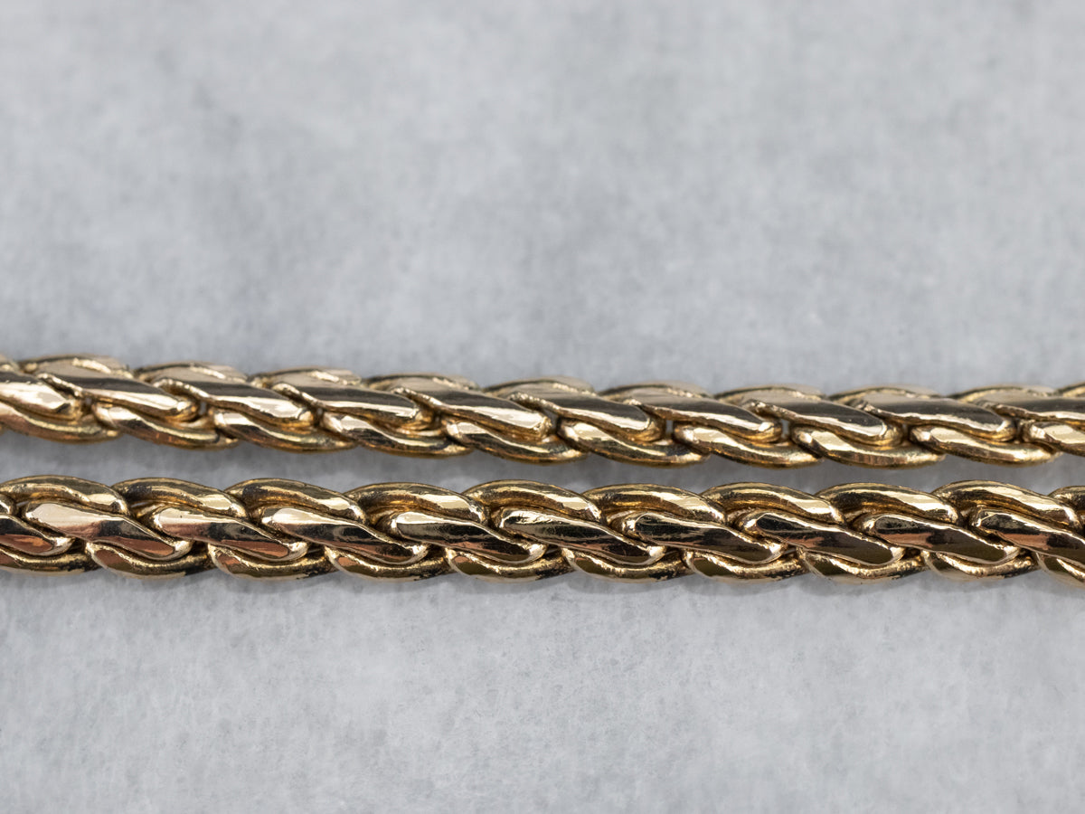 Cadena de eslabones tejidos en oro amarillo llamativo