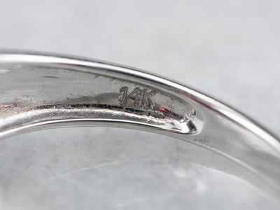 Modern Pyrope Garnet and Diamond Halo Ring