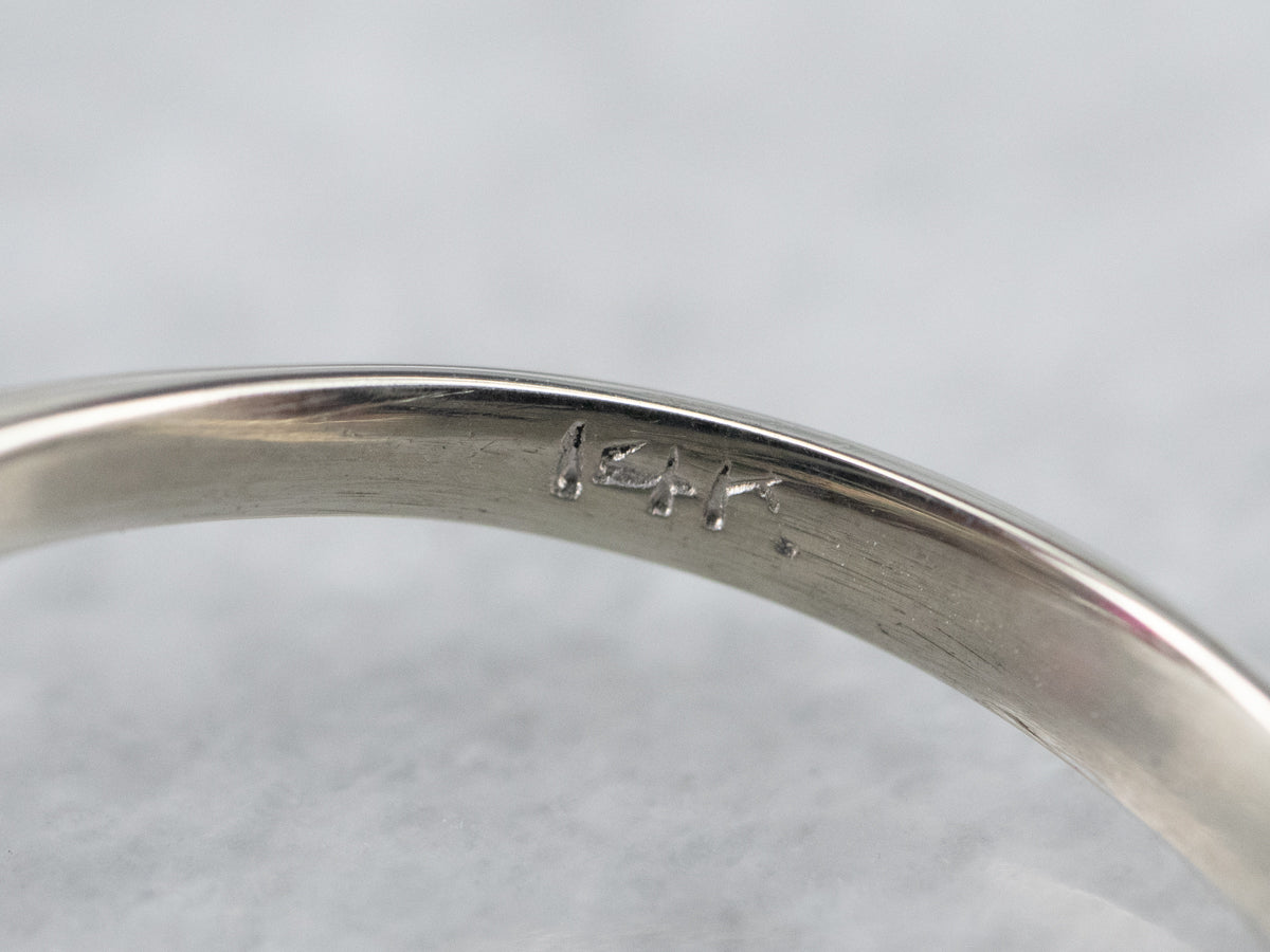 White Gold Ruby and Diamond Halo Ring