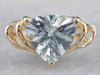 10K Yellow Gold Looped Shoulder Trillion Cut Aquamarine Solitaire Ring