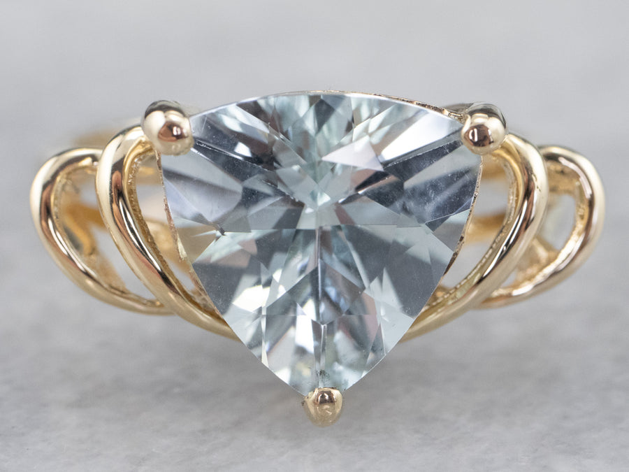 10K Yellow Gold Looped Shoulder Trillion Cut Aquamarine Solitaire Ring