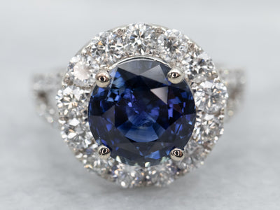 Contemporary Benchmark Quality Sapphire Halo Ring
