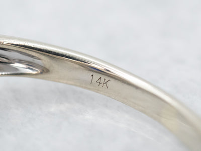 Contemporary Benchmark Quality Sapphire Halo Ring