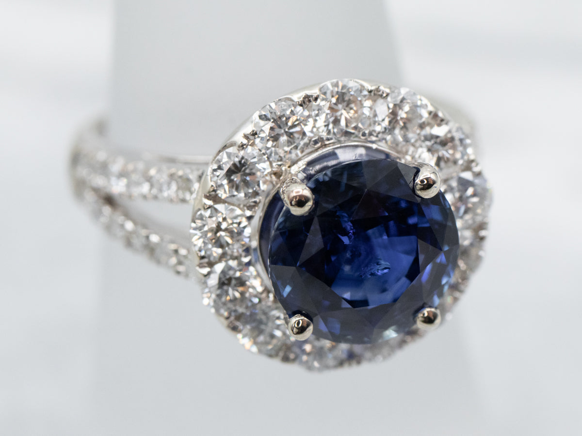 Contemporary Benchmark Quality Sapphire Halo Ring