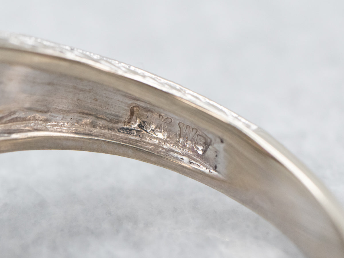 Modern Pink Sapphire and Diamond Halo Ring