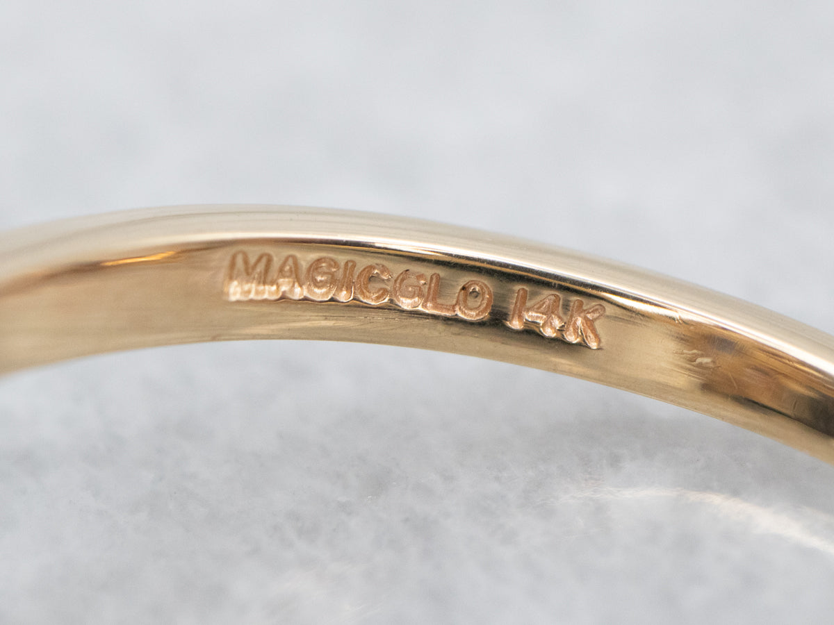 Marquise Tanzanite and Diamond Halo Ring