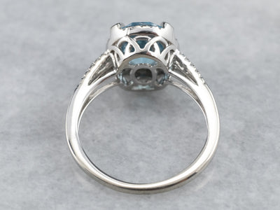 White Gold Blue Topaz Diamond Halo Ring