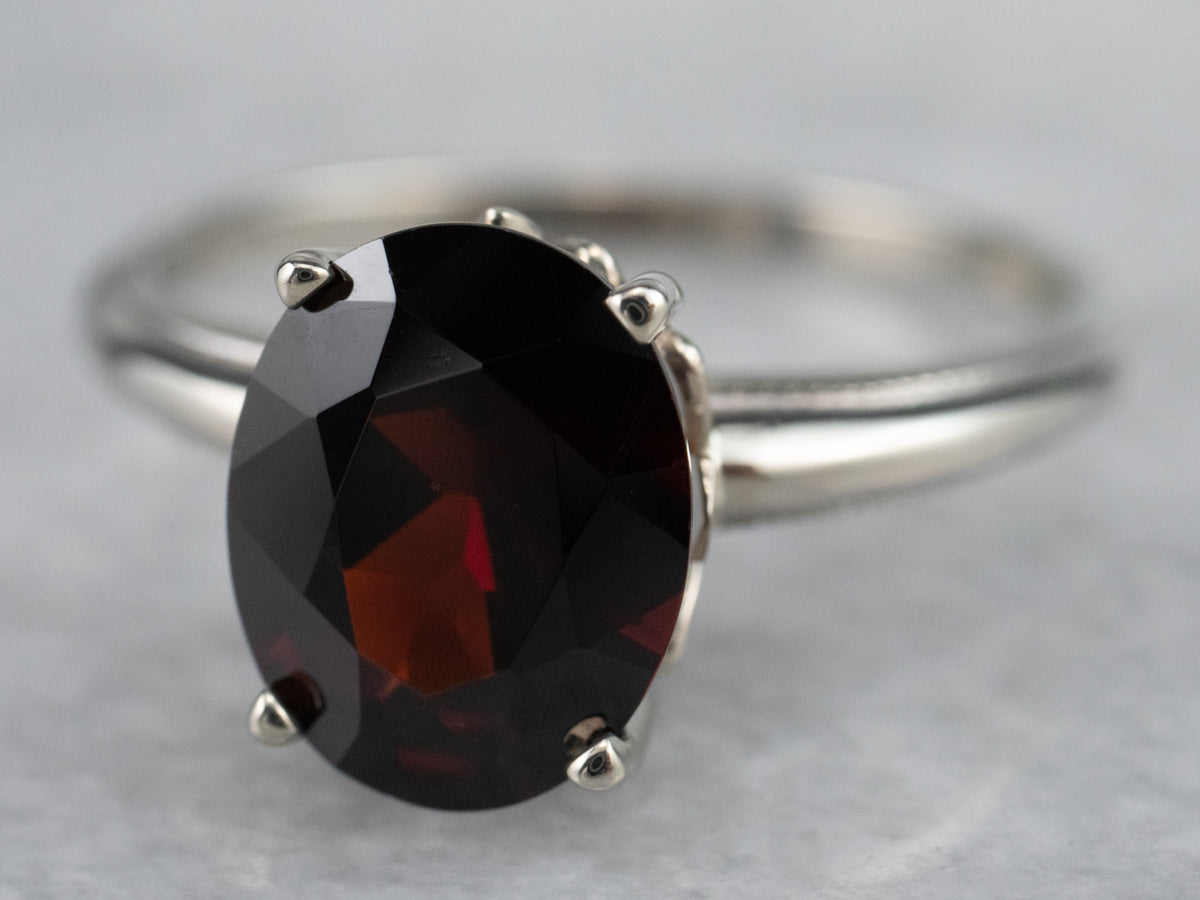 Anillo Solitario Granate Oro Blanco