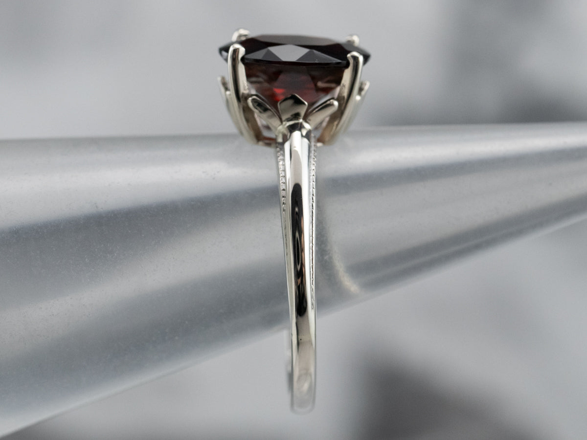 Anillo Solitario Granate Oro Blanco