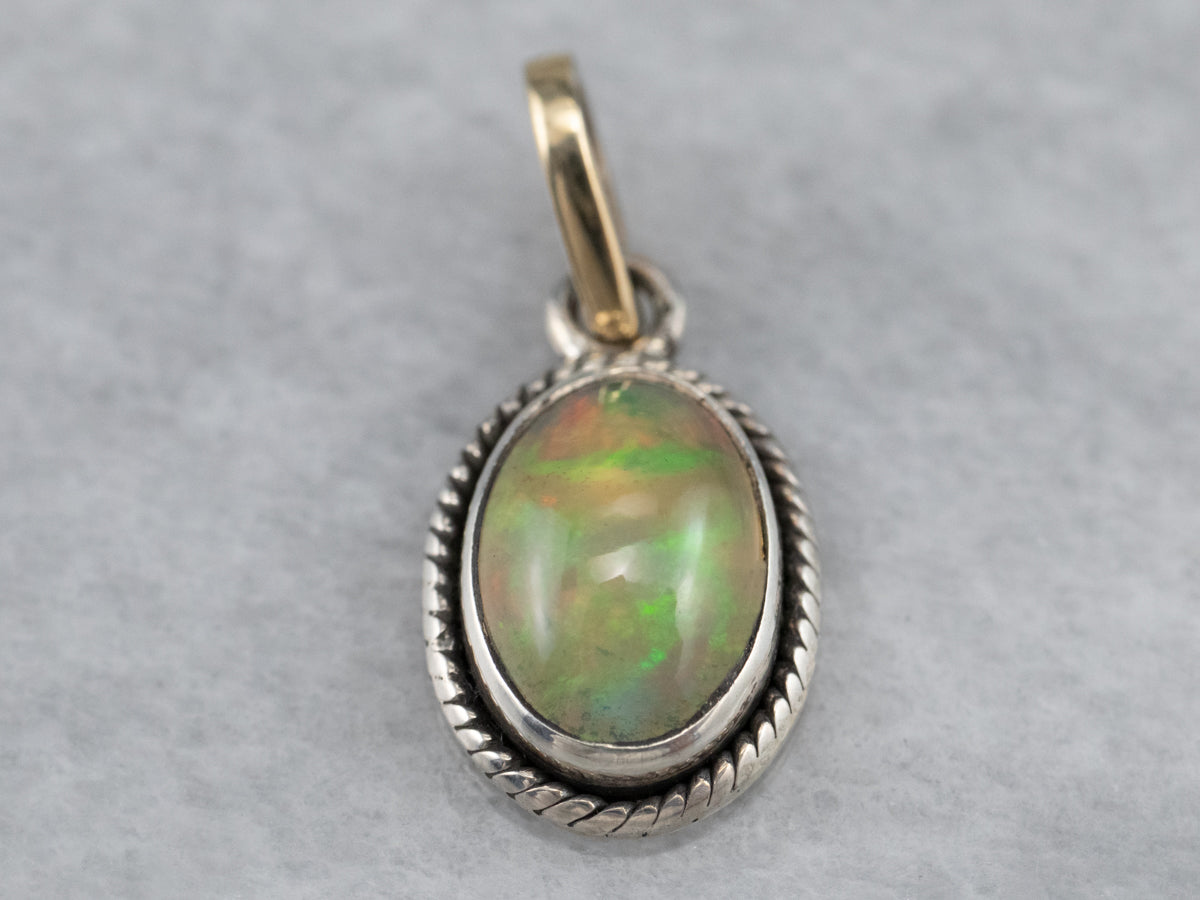 Sterling Silver, 14K Yellow Gold Rope Bezel Set Opal Oval Solitaire Pendant