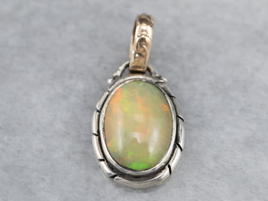 Sterling Silver, 14K Yellow Gold Bezel Set Opal Oval Solitaire Pendant