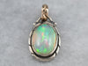 Sterling Silver, 10K Yellow Gold Ornate Bezel Set Opal Oval Solitaire Pendant