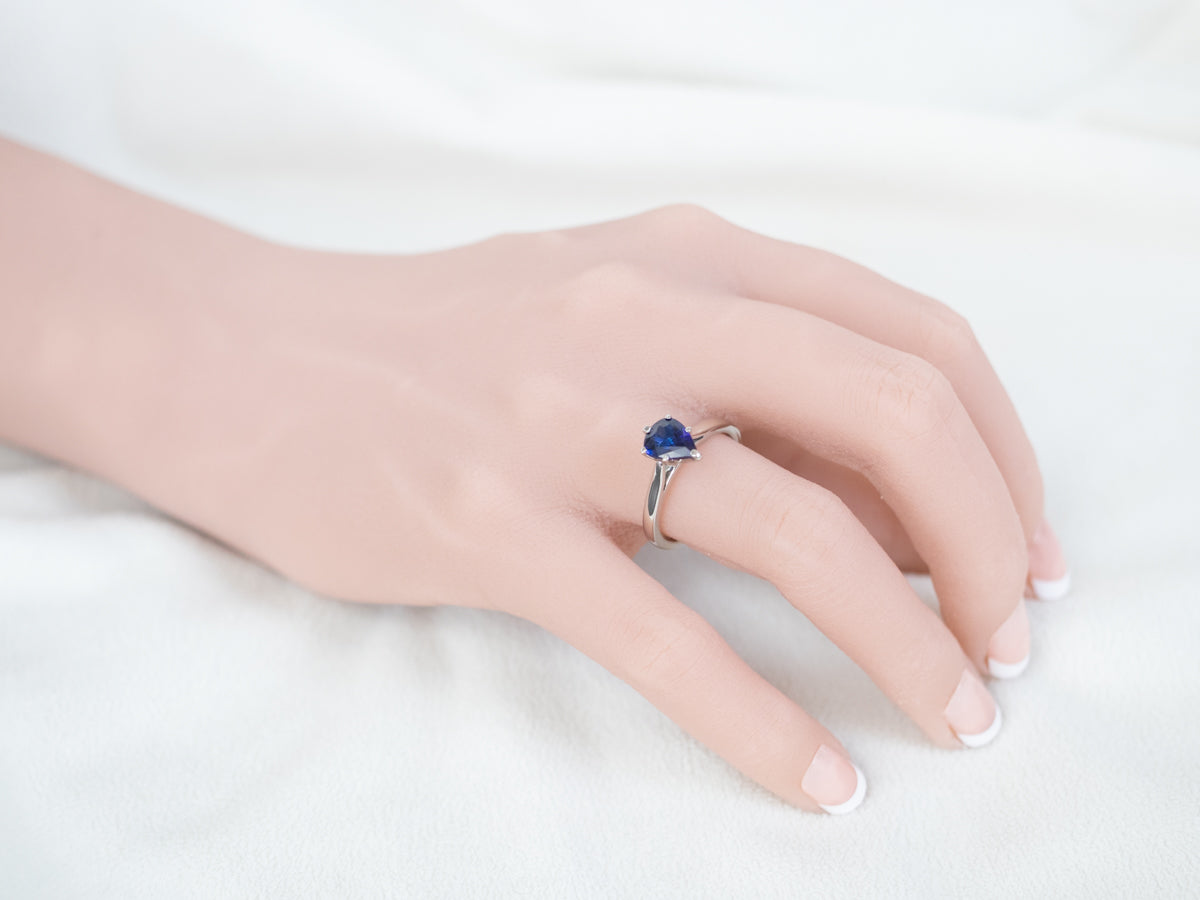 Pear Cut Sapphire Solitaire Platinum Ring