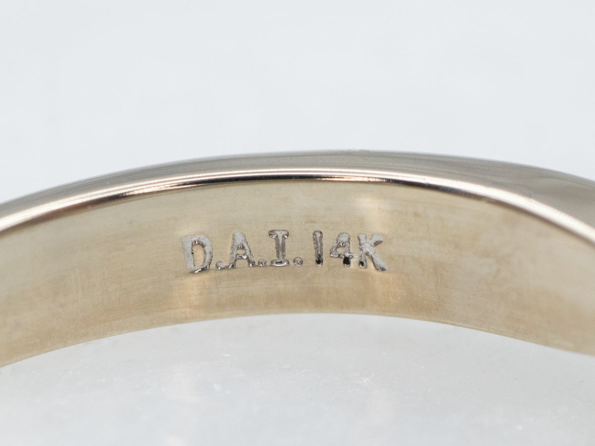 Sleek Sapphire and Diamond Engagement Ring