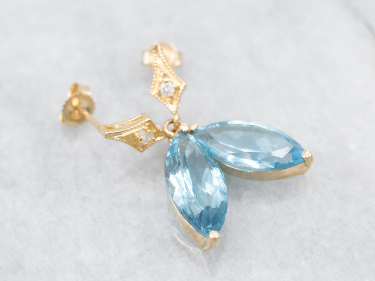 Pendientes colgantes con topacio azul marquesa y diamantes