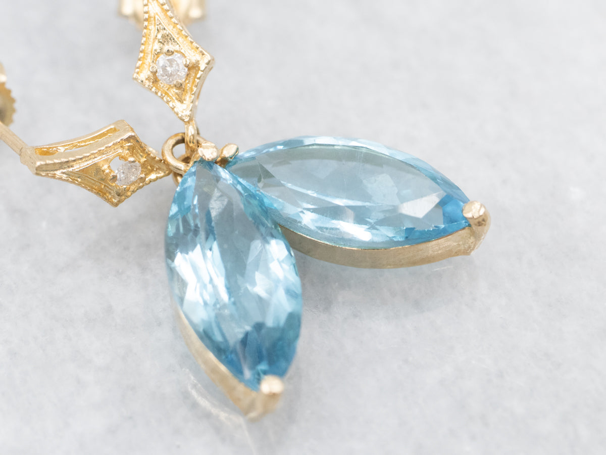 Pendientes colgantes con topacio azul marquesa y diamantes