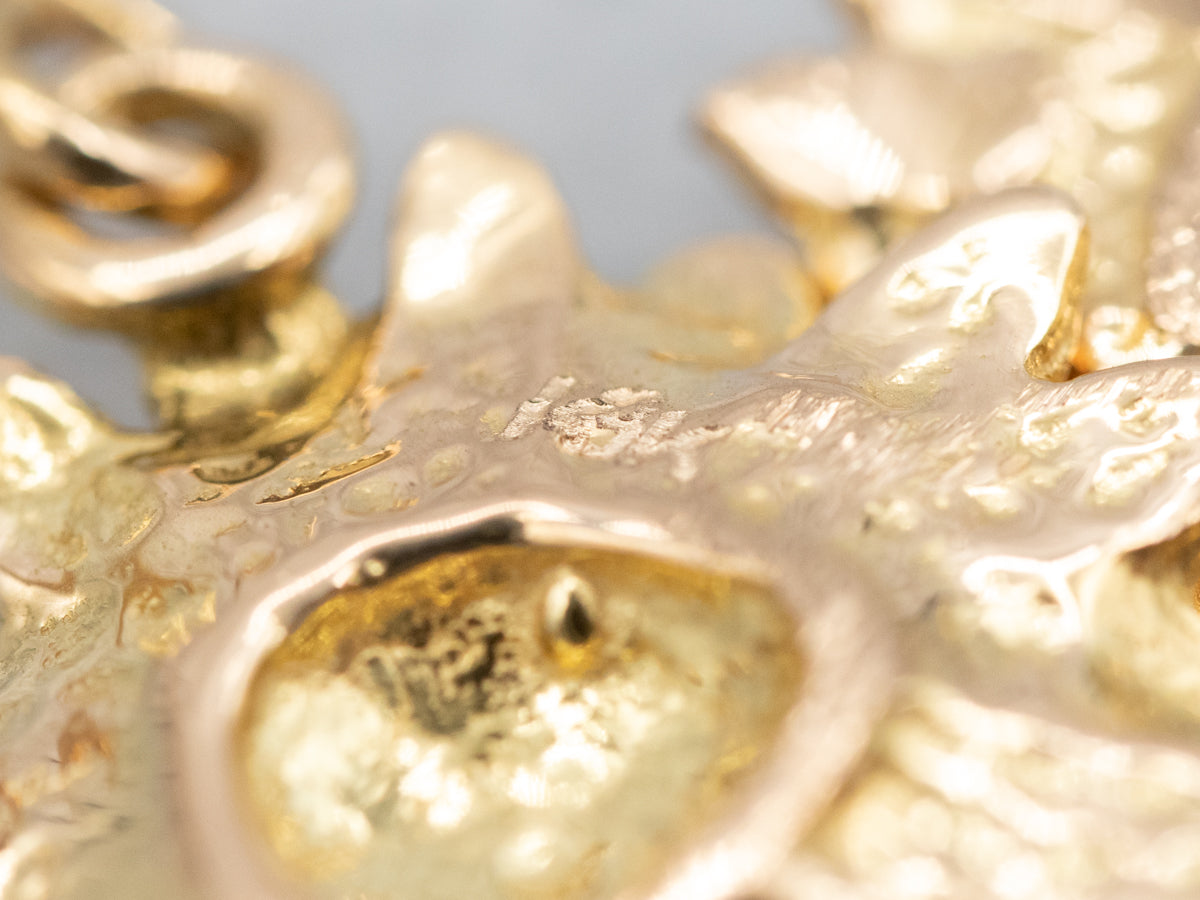 Pendientes colgantes de girasol en oro amarillo de 18 quilates