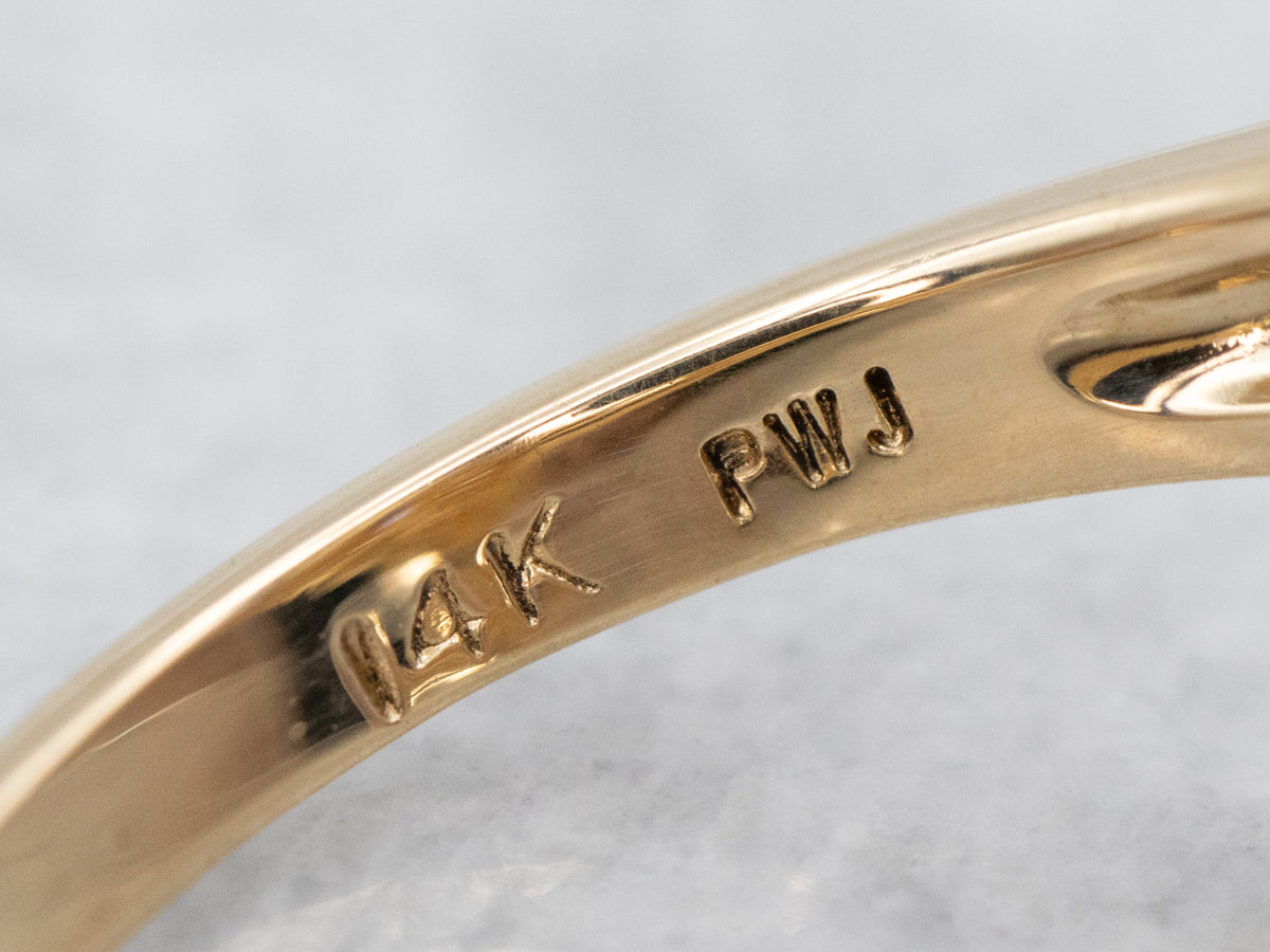 Marquise Tanzanite and Diamond Cluster Ring