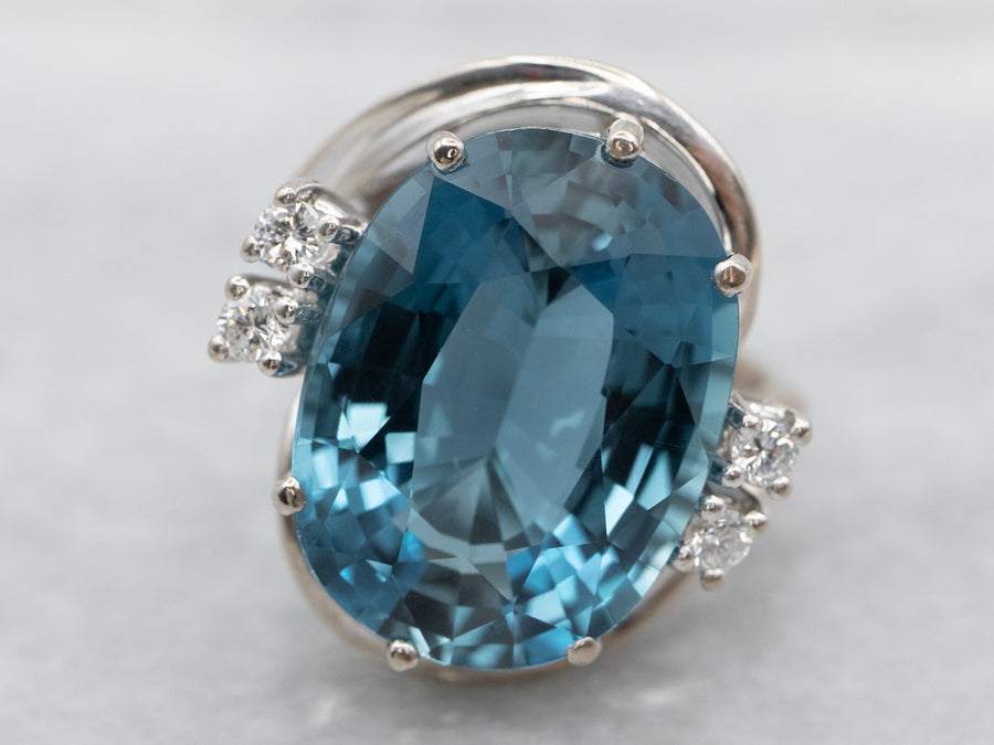 14K White Gold Blue Topaz Oval and Diamond Accent Bypass Cocktail Ring