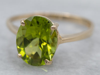 Peridot Solitaire Ring in Yellow Gold