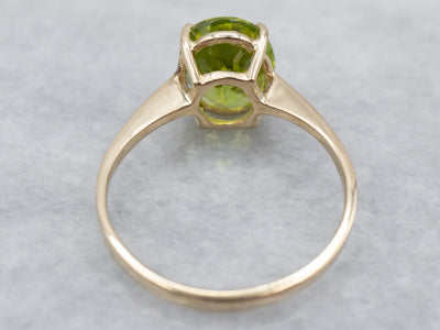 Peridot Solitaire Ring in Yellow Gold