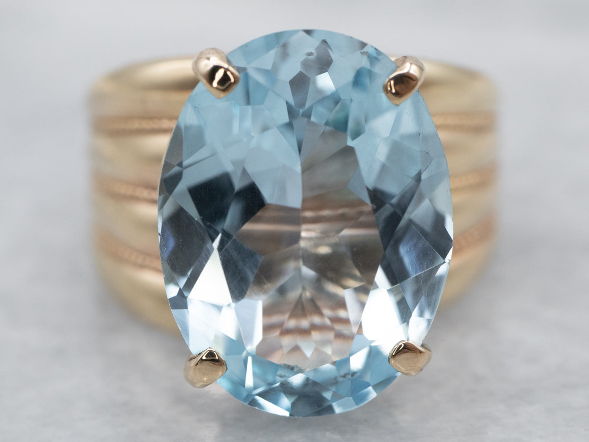 Gold Blue Topaz Cocktail Ring