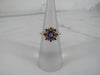 Amethyst Flower Ring with Surrounding Rubies