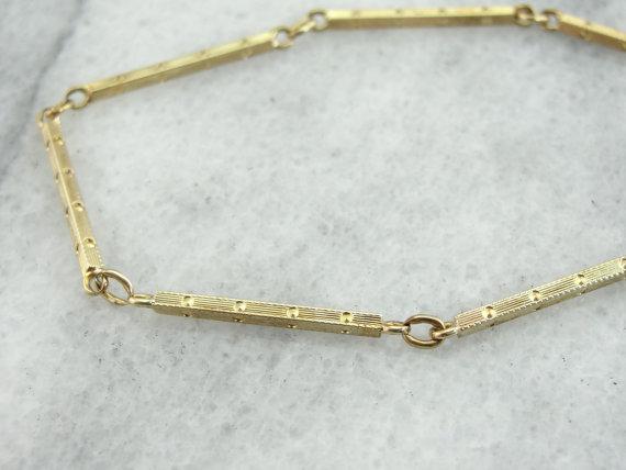 Cadena de reloj de bolsillo de la era retro de oro de 14 quilates