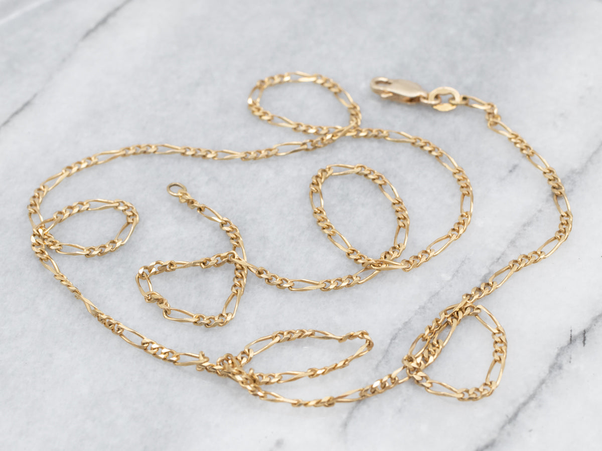 Long 18K Yellow Gold Figaro Chain