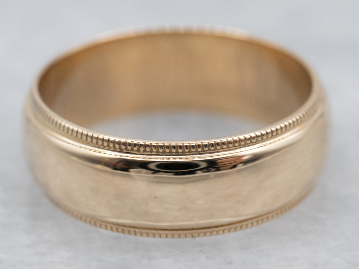 Anillo con borde milgrain en oro amarillo de 14 quilates
