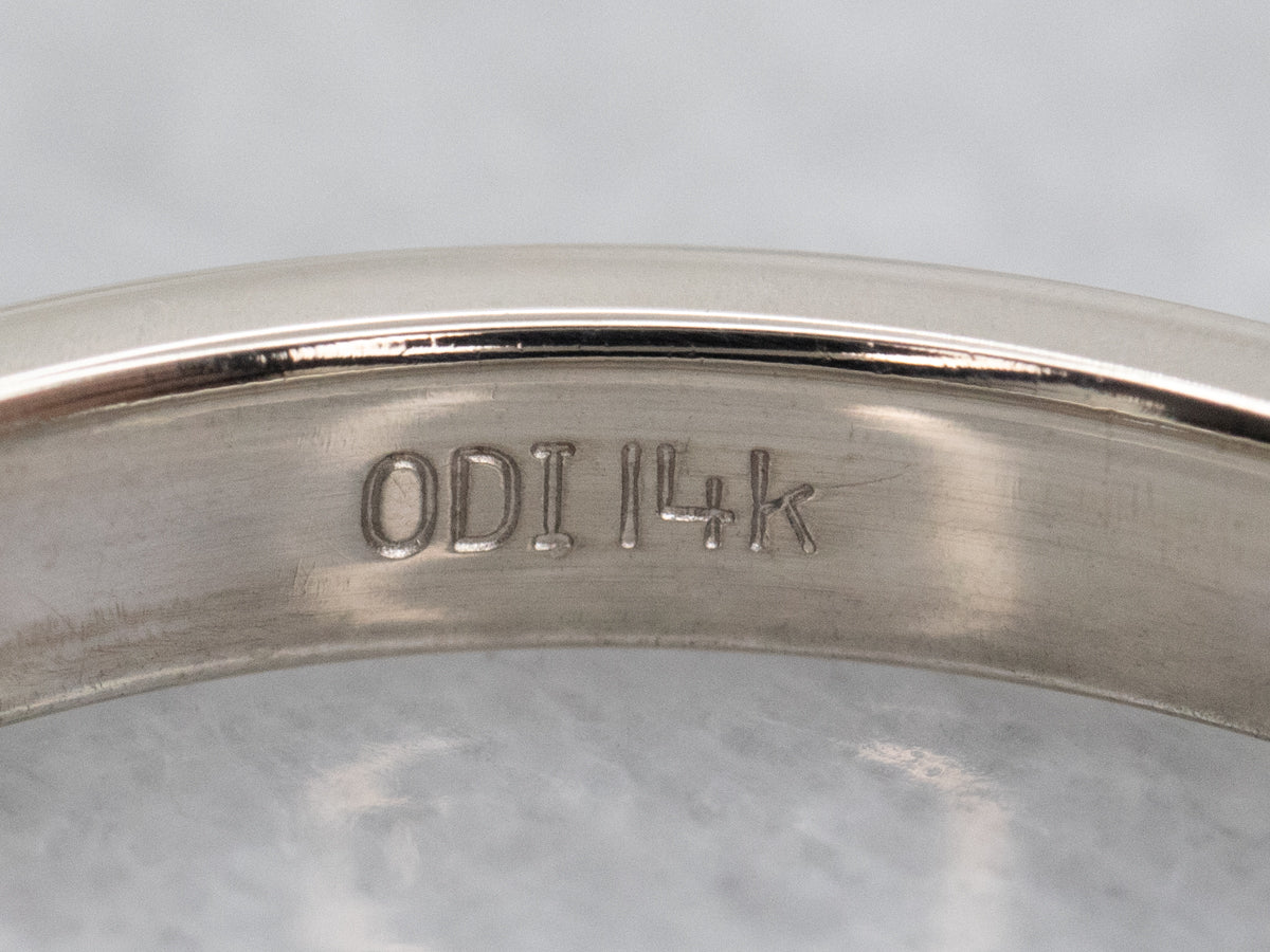 Elegante banda de oro blanco con diamantes