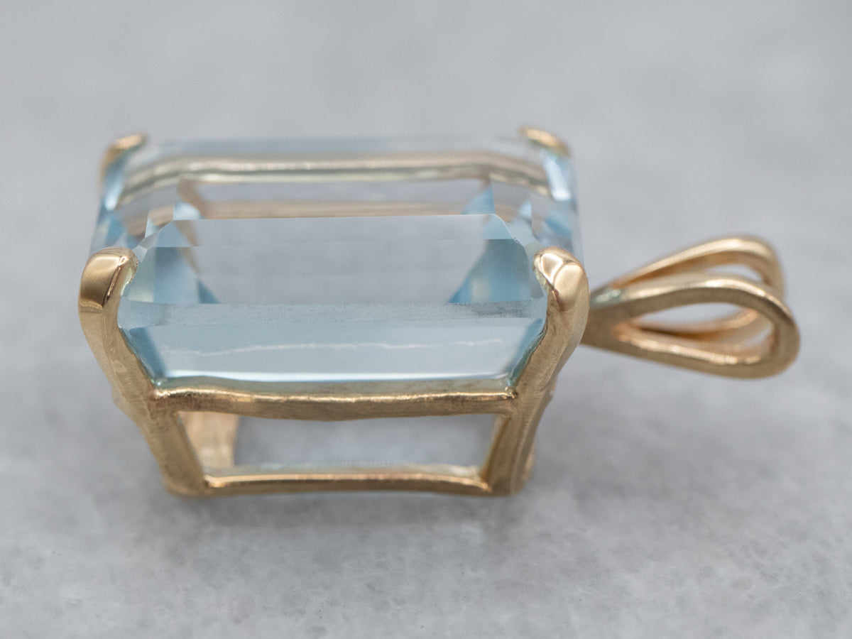 Blue Topaz Solitaire Pendant in Yellow Gold