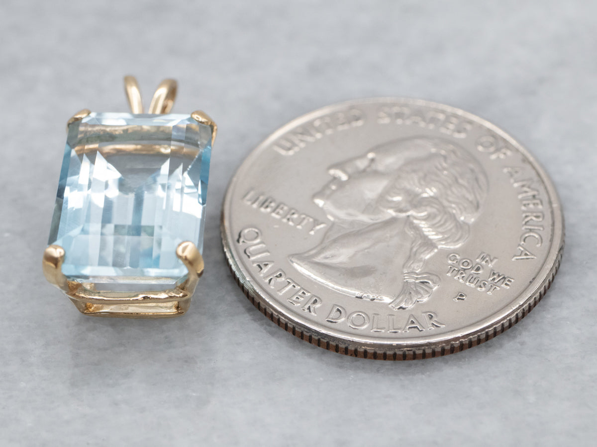 Blue Topaz Solitaire Pendant in Yellow Gold