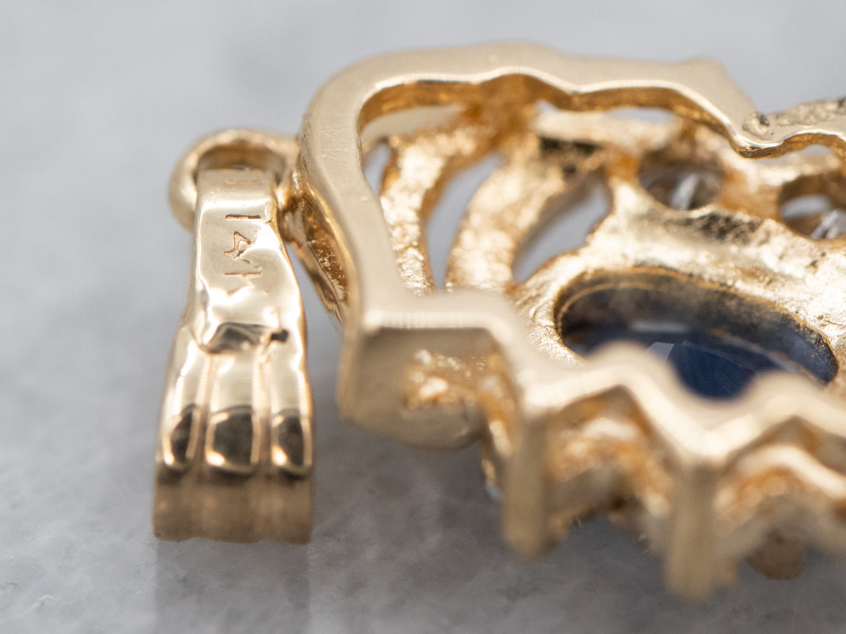 Colgante vintage de oro con zafiro y diamantes