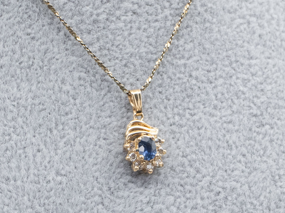 Colgante vintage de oro con zafiro y diamantes