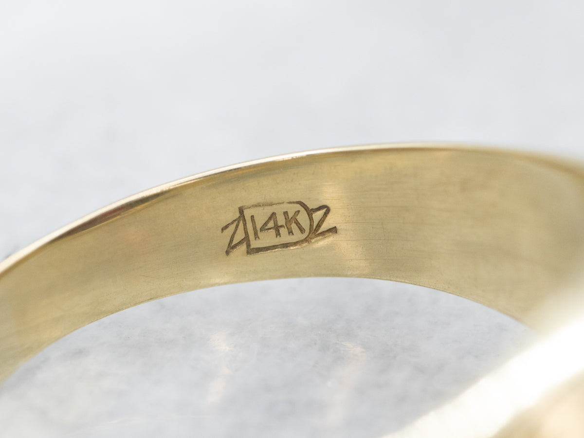 Anillo antiguo con solitario de granate piropo en oro de dos tonos