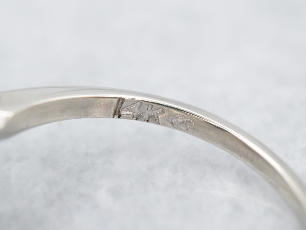 Pink Sapphire and Diamond Halo Ring