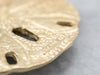 Golden Sapphire Sand Dollar Pendant
