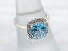 Modern Blue Topaz Diamond Halo Ring