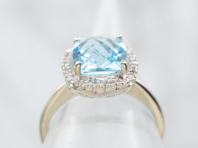 Modern Blue Topaz Diamond Halo Ring