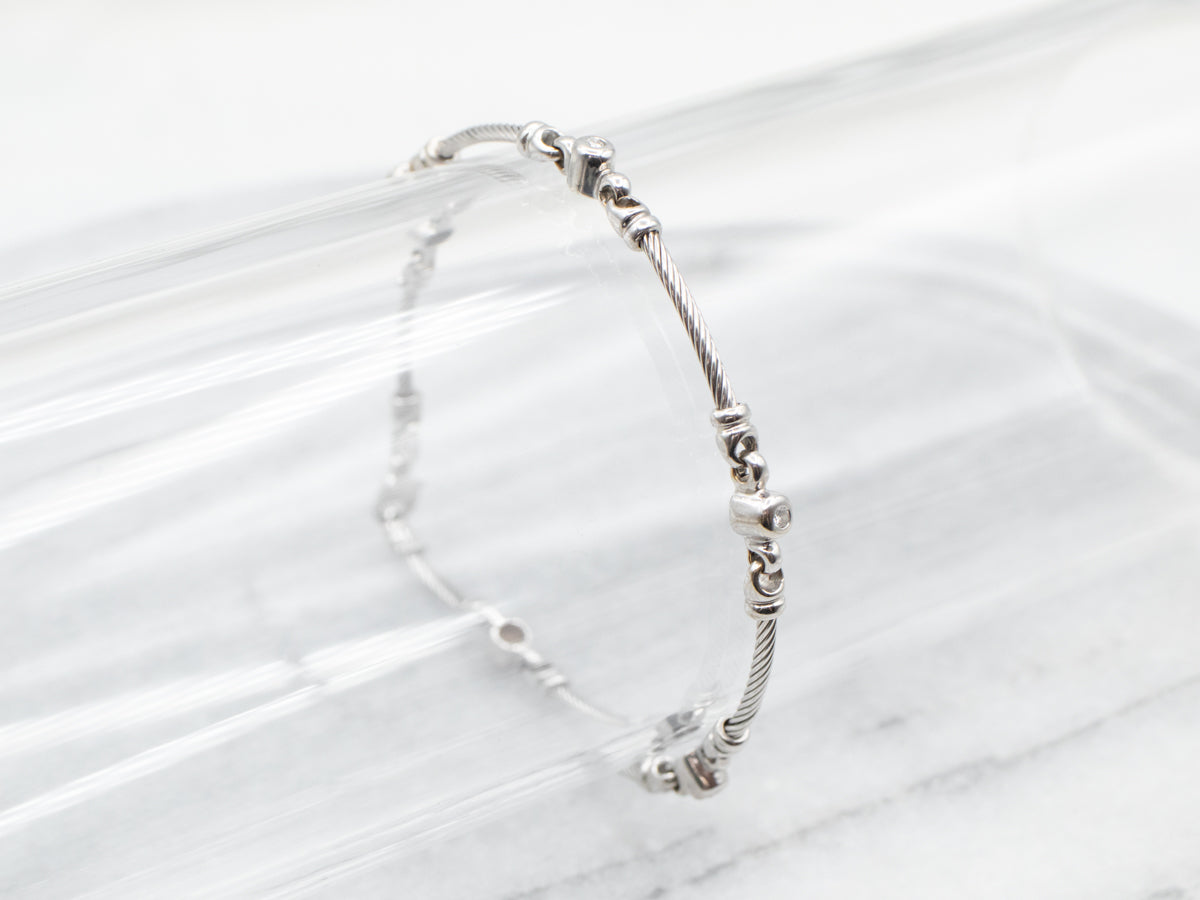 Twisting Links Diamond Bezel Bracelet
