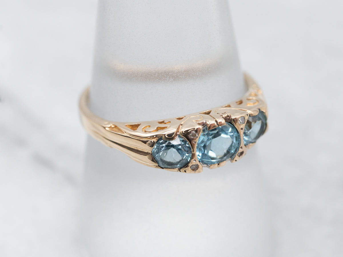 Shimmering Yellow Gold Blue Topaz and Diamond Ring