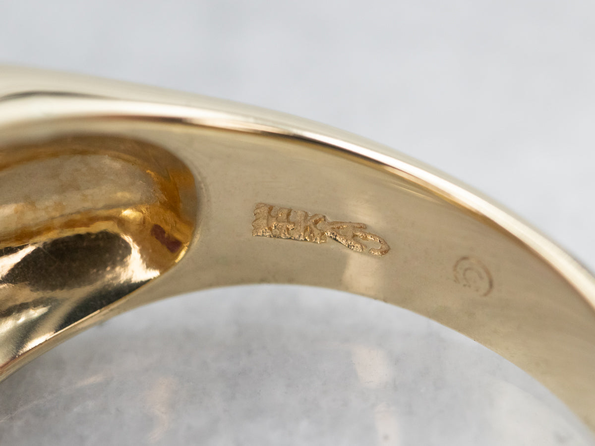 Anillo vintage con halo de diamantes y rubí sintético