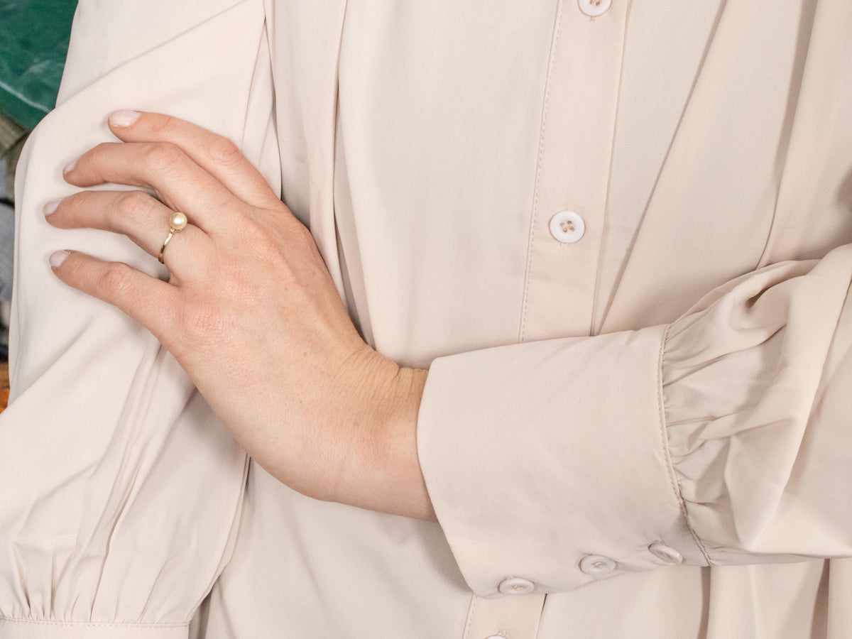 Simple Golden Pearl and Diamond Side Stone Ring