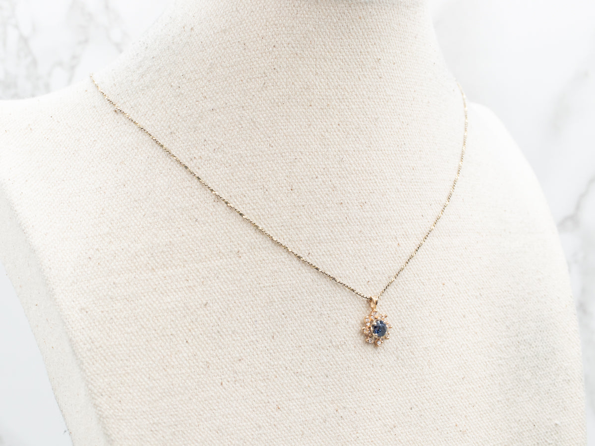 Blue Sapphire and Diamond Sun Halo Pendant